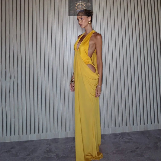 Side view of the sexy yellow spring dress for women, highlighting the draped pleated fabric, deep side cut-out, and elegant floor-length silhouette - Luxury evening wear - ALL IN 1 WORLD