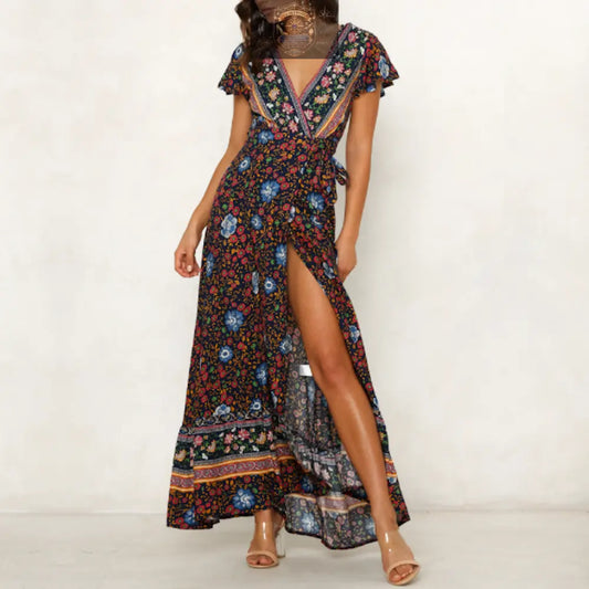Elegant black floral wrap maxi dress with vibrant multi-color flower patterns, featuring a plunging V-neck, butterfly sleeves, and a high-leg slit - Versatile bohemian summer gown - ALL IN 1 WORLD