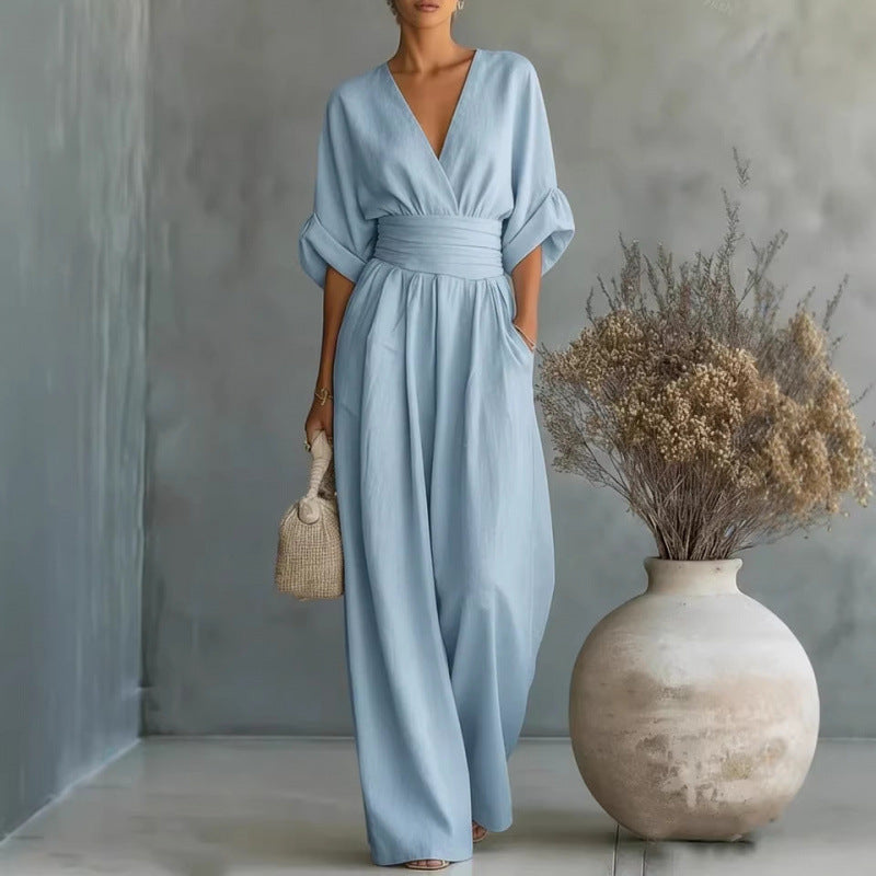 Woman wearing a light blue jumpsuit