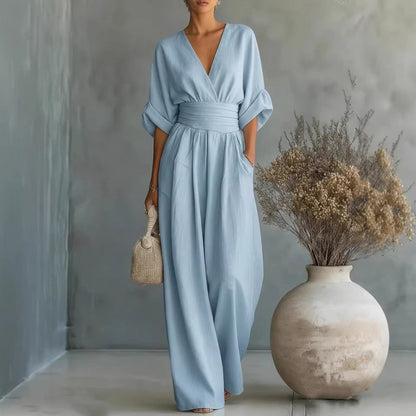 Woman wearing a light blue jumpsuit