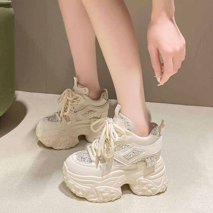 Hidden-heel sequin platform sneaker, side view