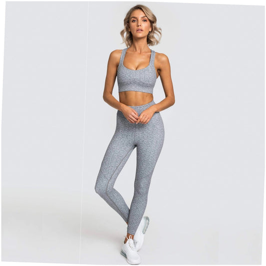 Grey sleeveless yoga set on model