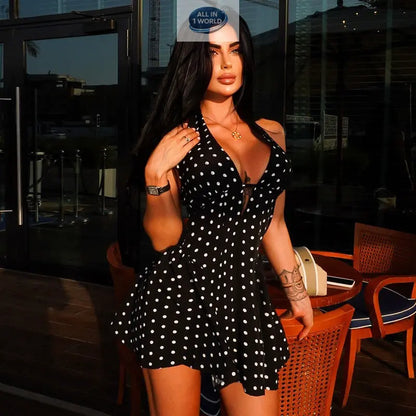 Chic black polka dot mini dress with white spots, featuring a deep V-neckline and a flattering A-line silhouette - Elegant halter-style summer party dress - ALL IN 1 WORLD
