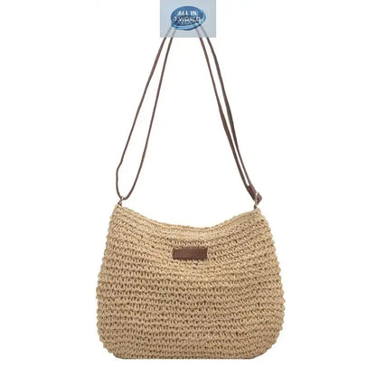 Front view of a light beige hand-woven summer straw shoulder bag on a white background - Featuring long brown leather-style straps and a minimalist rustic design - Versatile casual beach handbag - ALL IN 1 WORLD