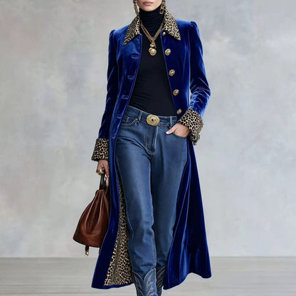Woman wearing a blue coat with leopard-print trim