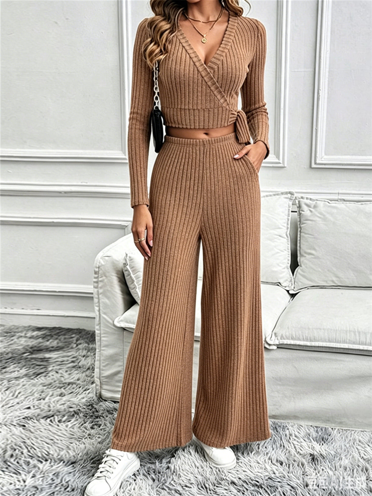 Woman wearing a knitted top and wide-leg pants