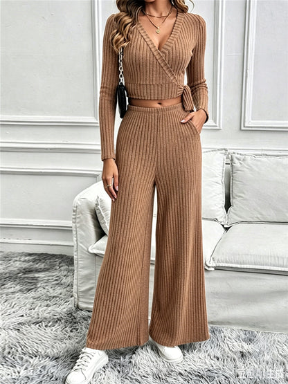 Woman wearing a knitted top and wide-leg pants