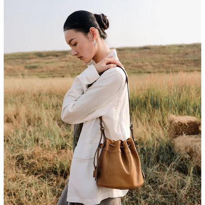 Sheepskin leather bucket bag, worn on shoulder