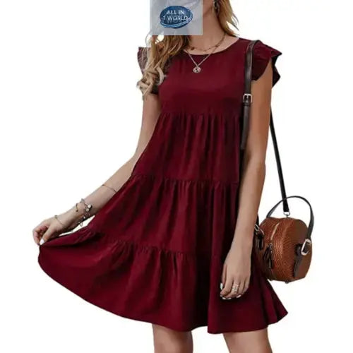Front view of an elegant burgundy tiered flowy mini dress featuring ruffled cap sleeves and a round neck - Lightweight loose-fit summer fashion for women - ALL IN 1 WORLD
