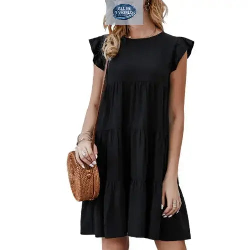 Classic black short flowy tiered dress for women featuring ruffled cap sleeves and a round neck - Versatile and elegant loose-fit mini dress styled with a round woven bag - ALL IN 1 WORLD
