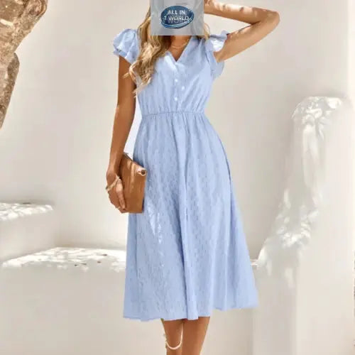 Full front view of a serene sky blue Swiss dot midi dress featuring ruffled cap sleeves and a V-neckline - Flowy summer A-line dress for women with an elasticated waist - Elegant and breathable vacation style - ALL IN 1 WORLD