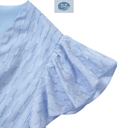 Close-up of the elegant ruffled cap sleeve on a sky blue Swiss dot dress - Detailed view of the textured chiffon fabric and ruffled edges - High-quality summer fashion detail - ALL IN 1 WORLD