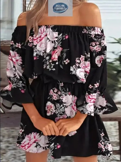 Short black off-shoulder floral dress for women with pink and white flower prints - Featuring a ruffled neckline and flare sleeves - Elegant sexy boho summer mini dress - ALL IN 1 WORLD