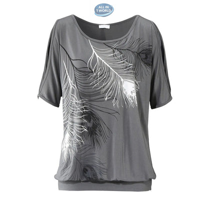 Professional studio shot of a grey women's t-shirt with a sophisticated peacock feather print - Features open-shoulder cut-out sleeves and a comfortable banded hemline - Minimalist boho summer top - ALL IN 1 WORLD